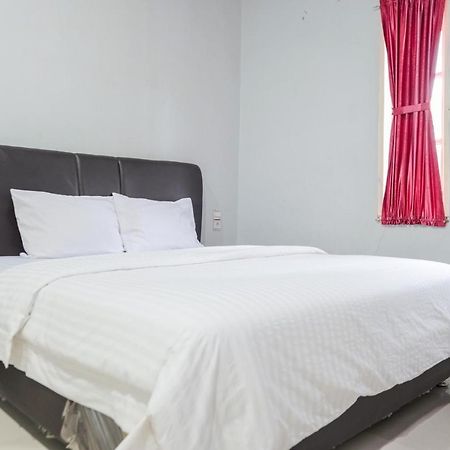 Djaboerigin Mongonsidi Guest House Medan Buitenkant foto