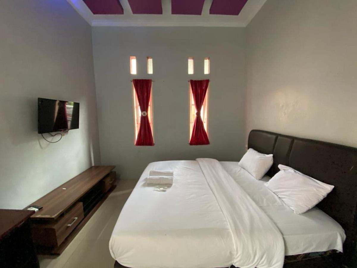 Djaboerigin Mongonsidi Guest House Medan Buitenkant foto