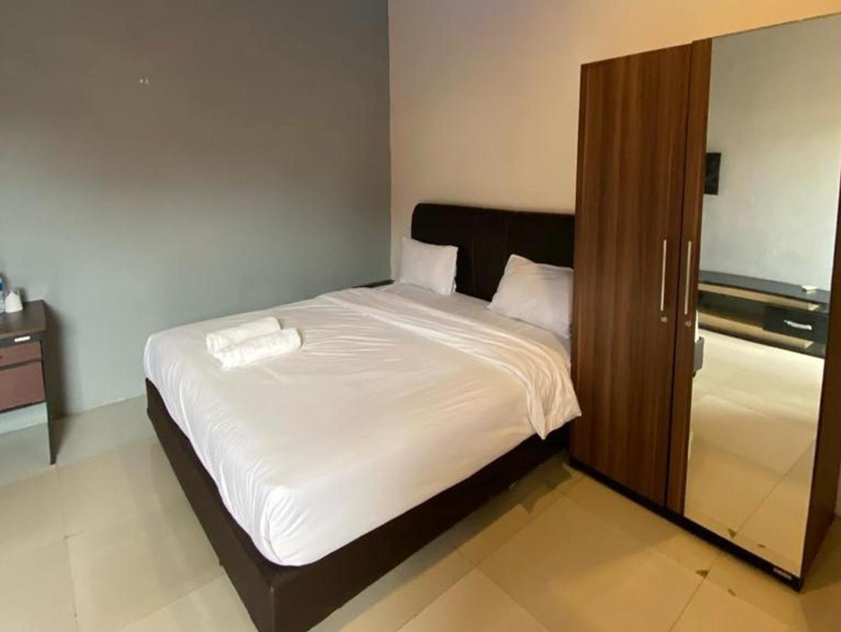 Djaboerigin Mongonsidi Guest House Medan Buitenkant foto