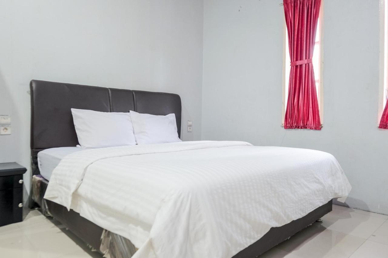 Djaboerigin Mongonsidi Guest House Medan Buitenkant foto