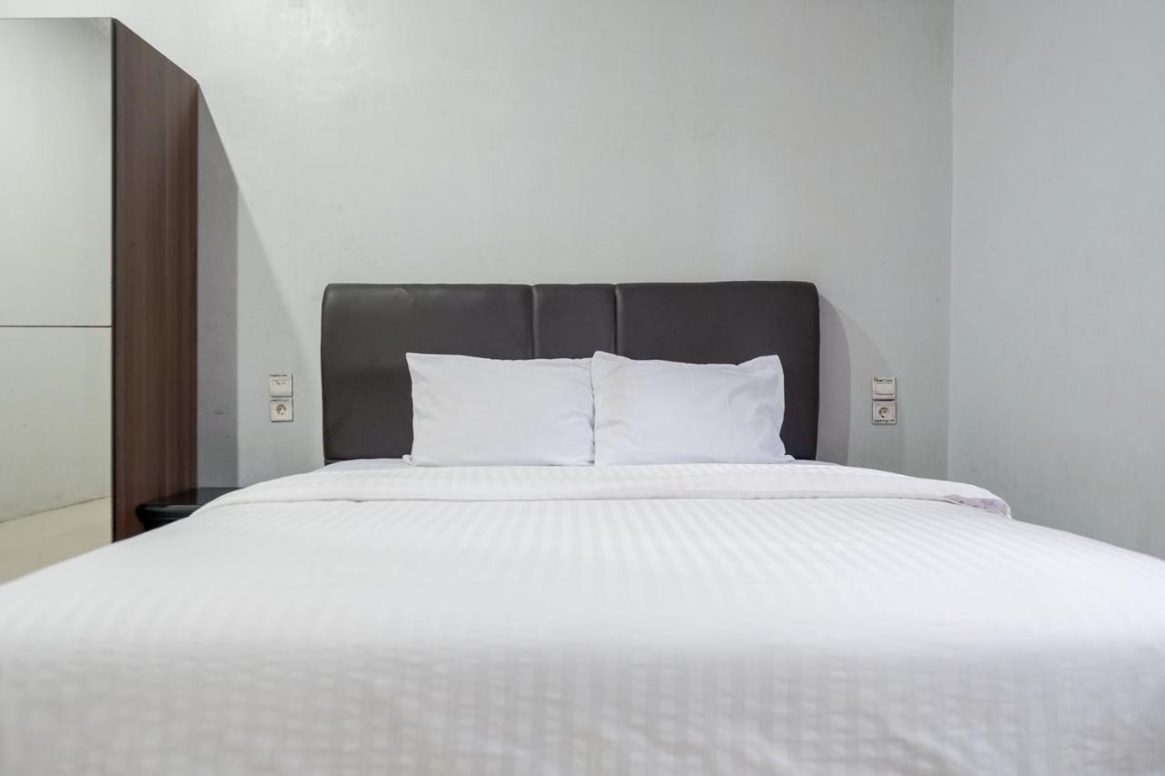 Djaboerigin Mongonsidi Guest House Medan Buitenkant foto